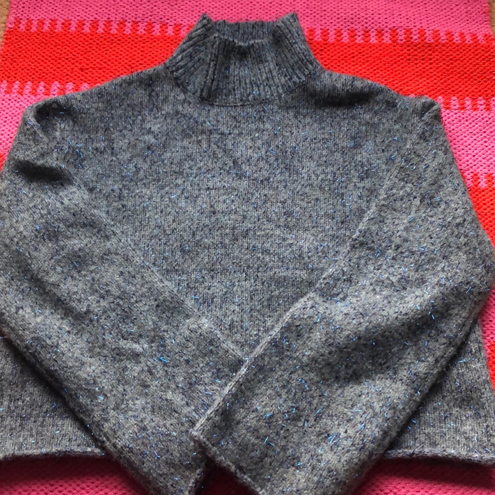 Cropped metallic blue turtleneck sweater